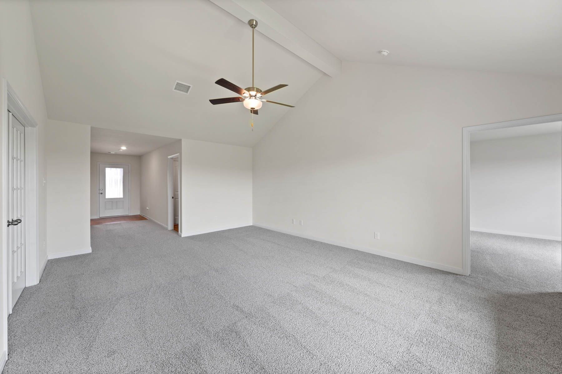The spacious family room is perfect for family living and hosting.