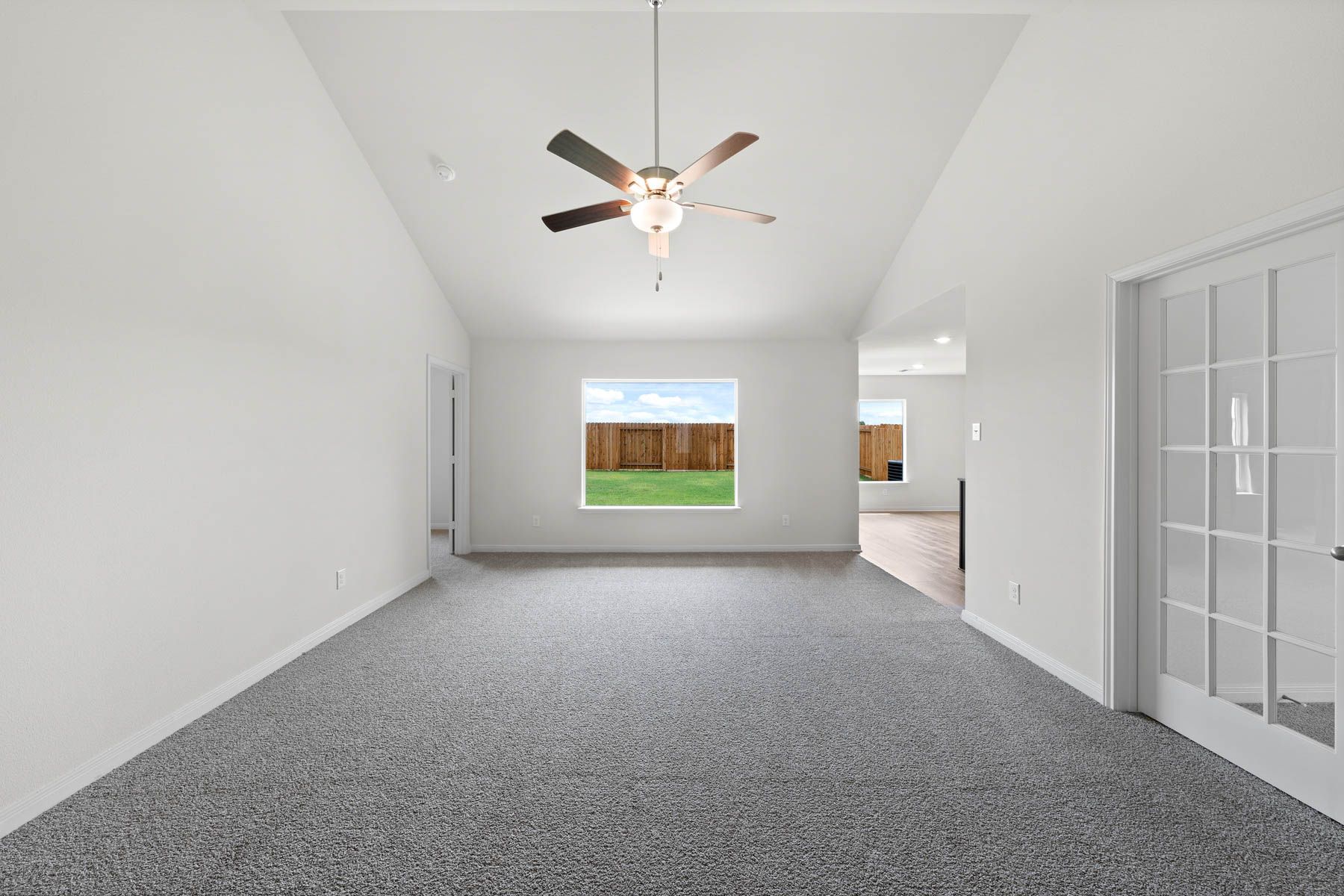 The spacious family room is perfect for family living and hosting.