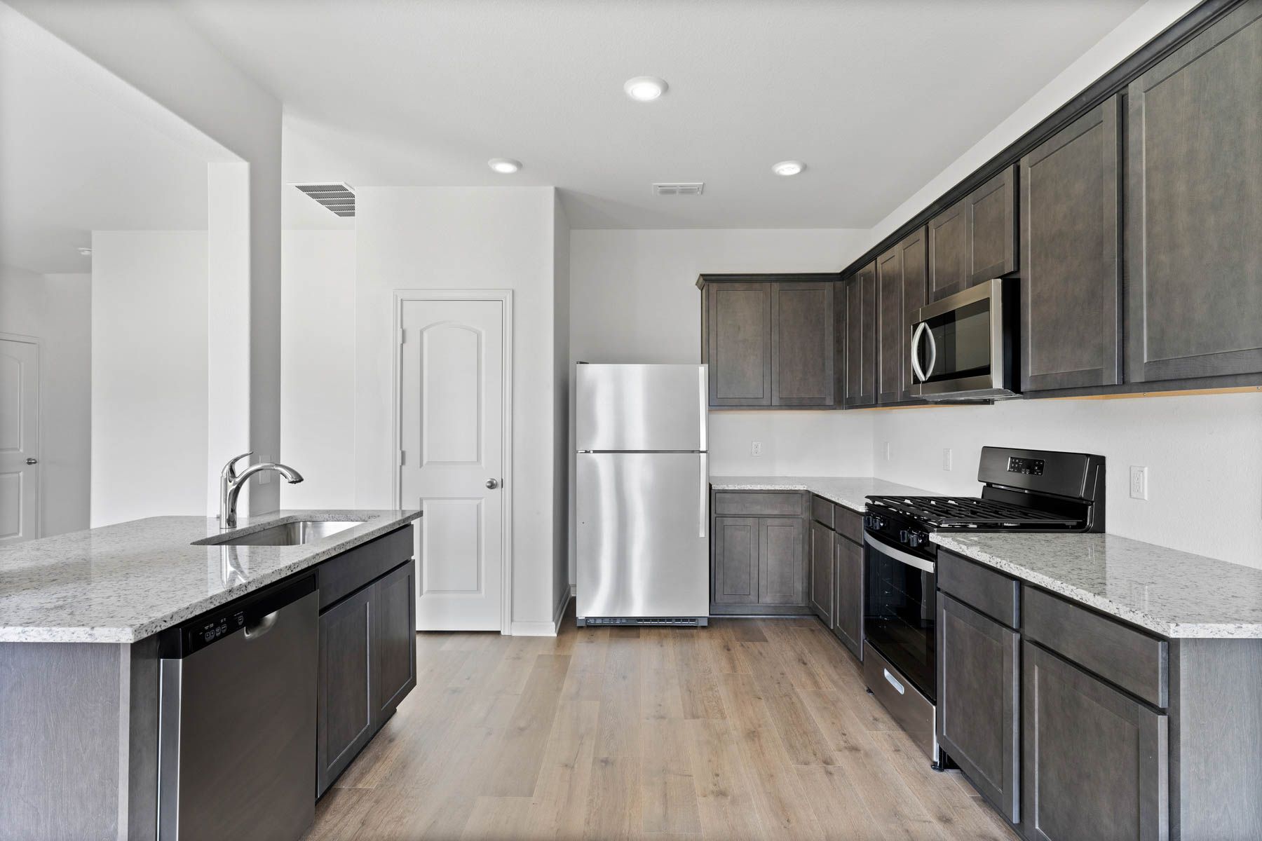 The kitchen has energy efficient appliances.