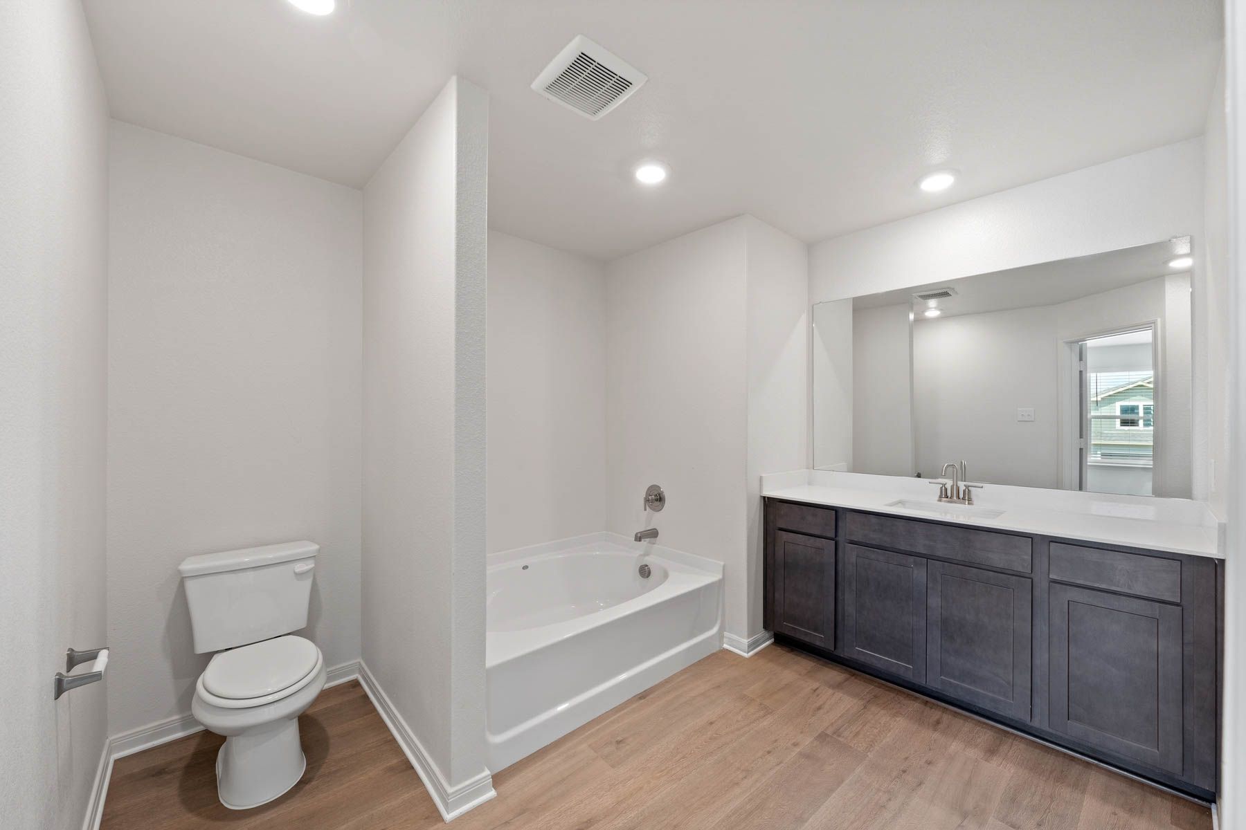 The master bathroom has a garden tub.