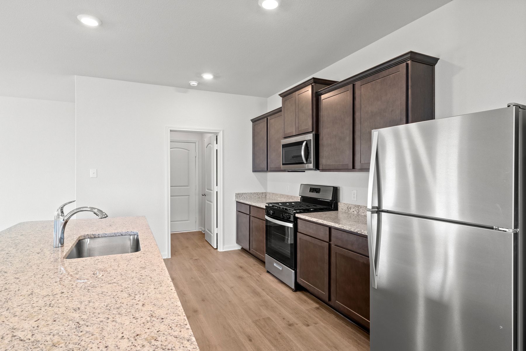 The kitchen has energy efficient appliances.