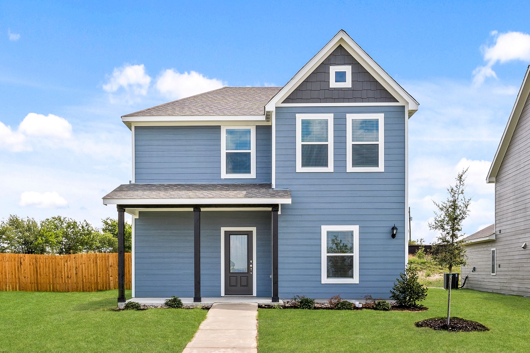 The Dogwood is a beautiful two-story siding home.