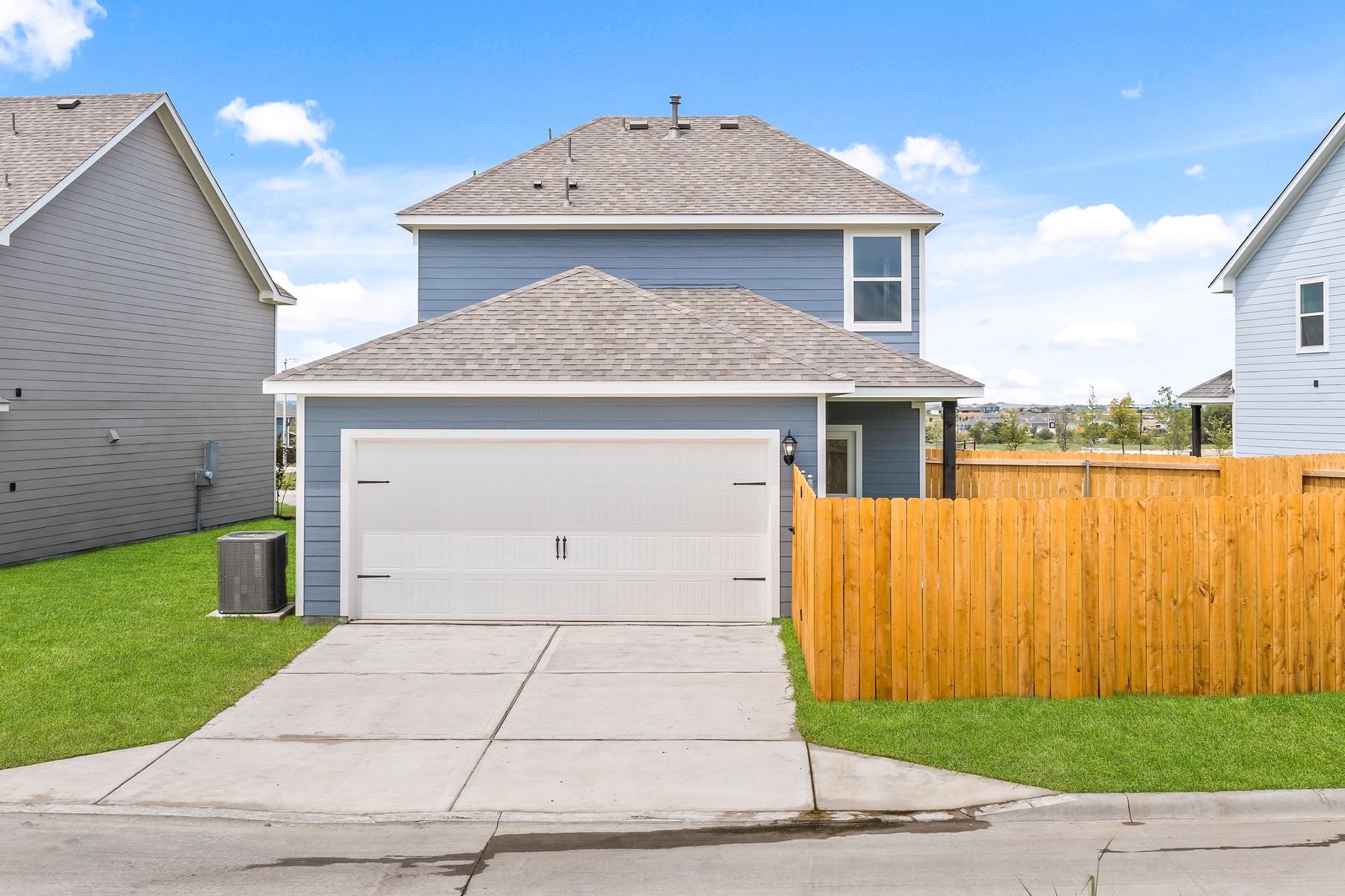 The Dogwood plan has an ally-load, two-car garage.