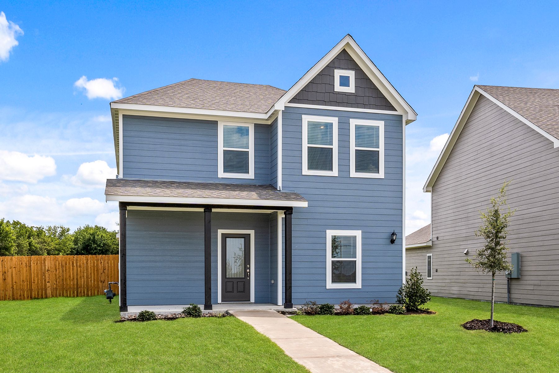 The Dogwood is a beautiful two-story siding home.