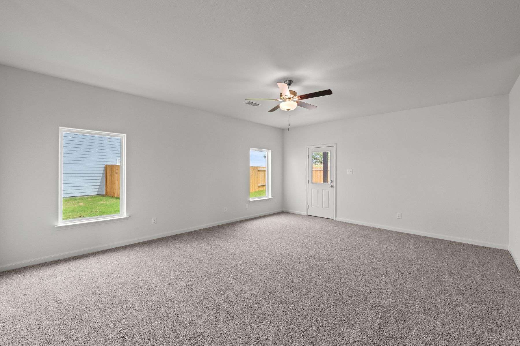 The spacious family room is perfect for family living and hosting.