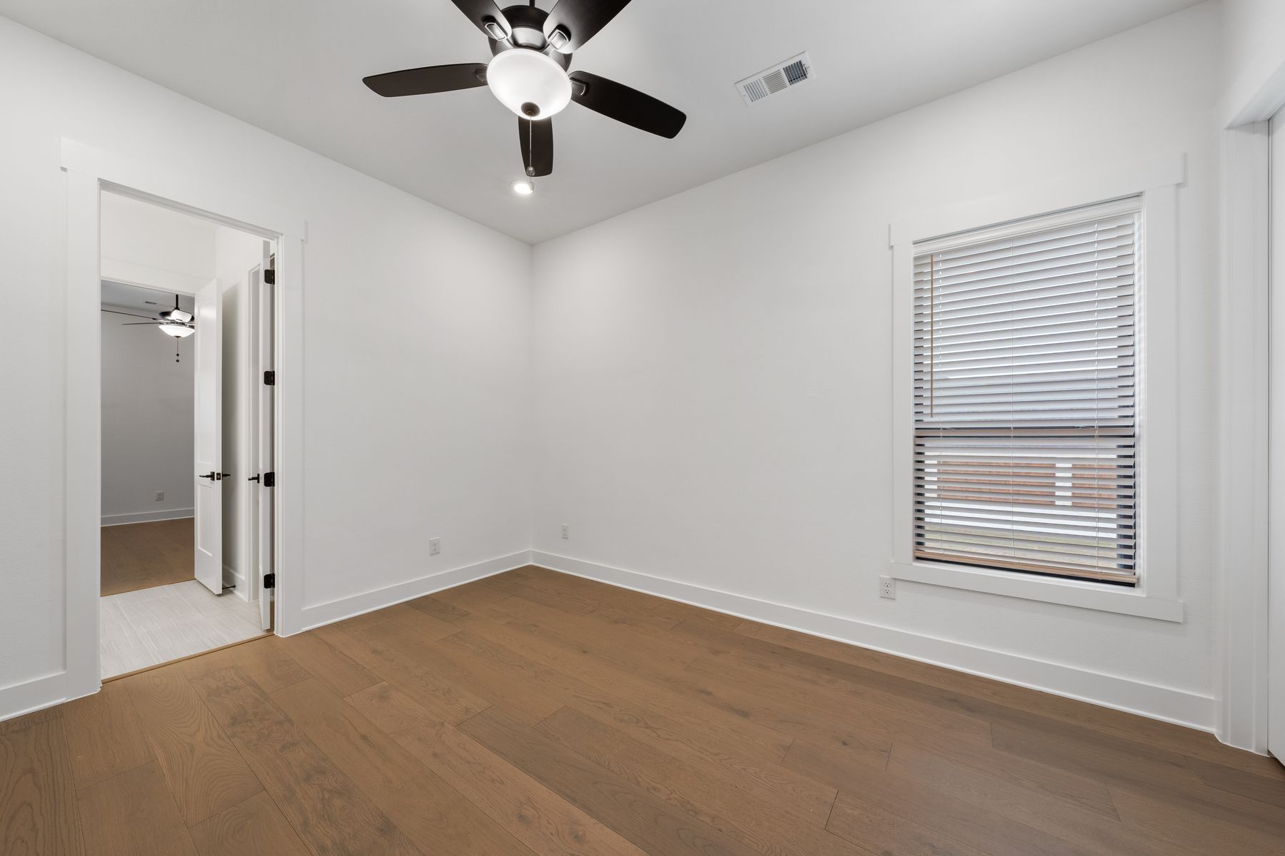The secondary bedrooms in this home are the perfect space for children's bedrooms or guest rooms.