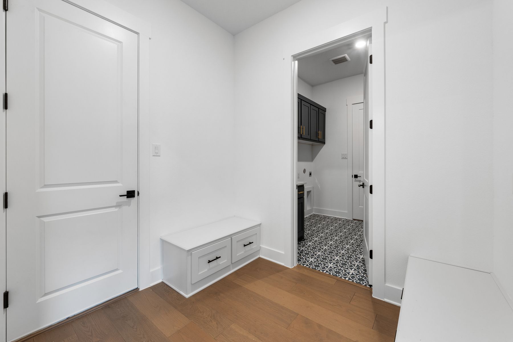 The mudroom is the perfect space to store your family's things right by the door to the garage, and it is adjacent to the large laundry room.