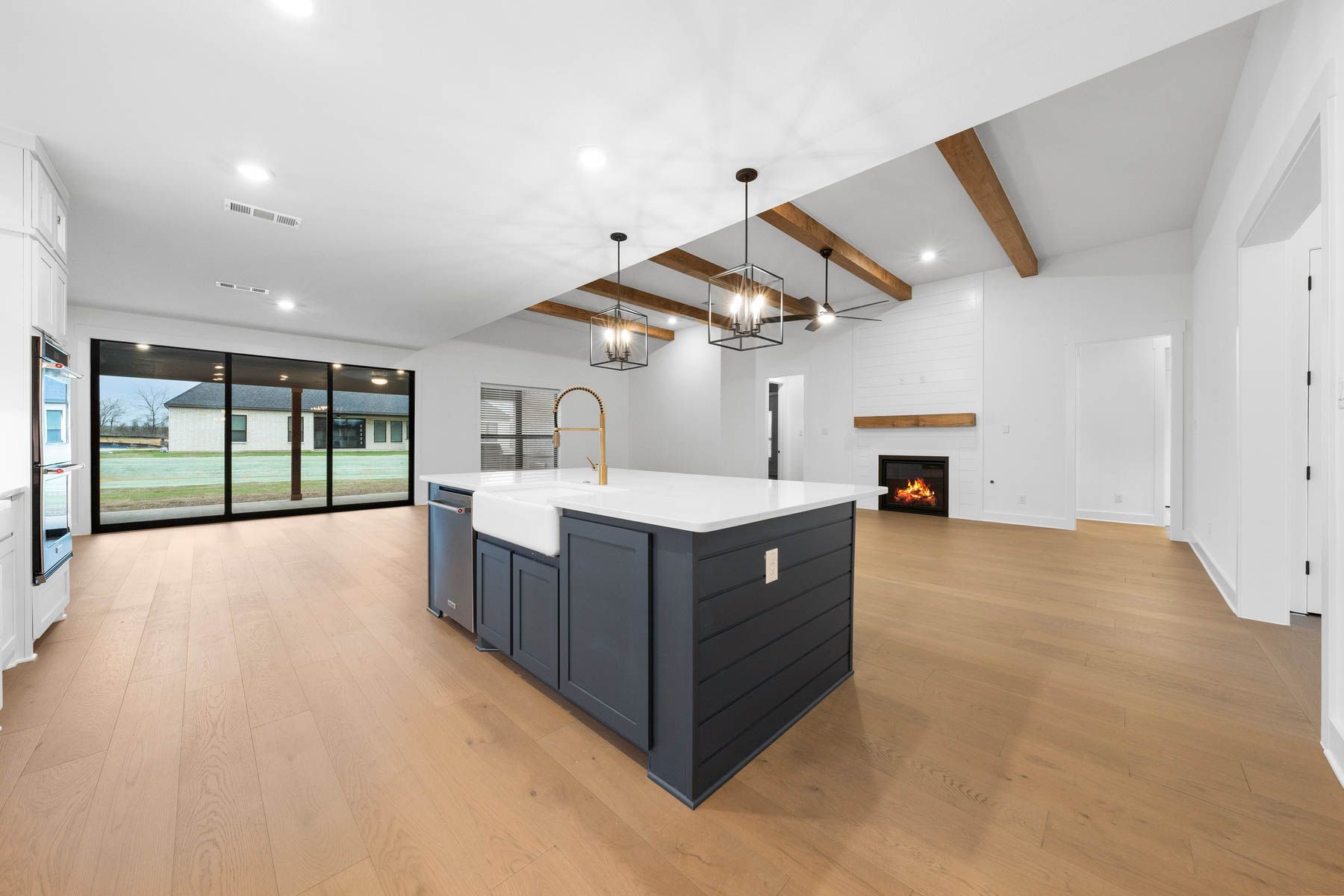 The open layout connects the kitchen with the breakfast area and family room.