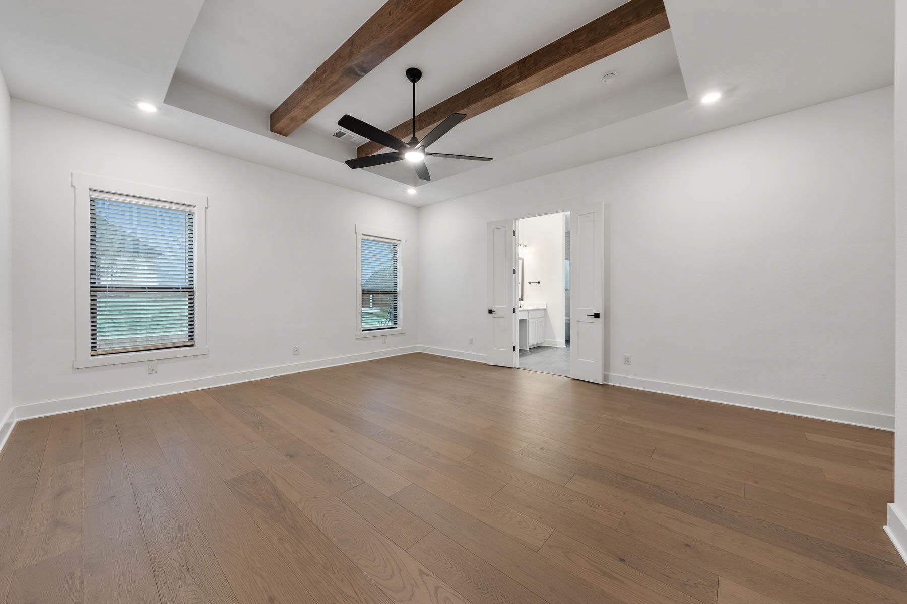 The peaceful master suite has a large bedroom, spa-like bathroom and giant walk-in closet.
