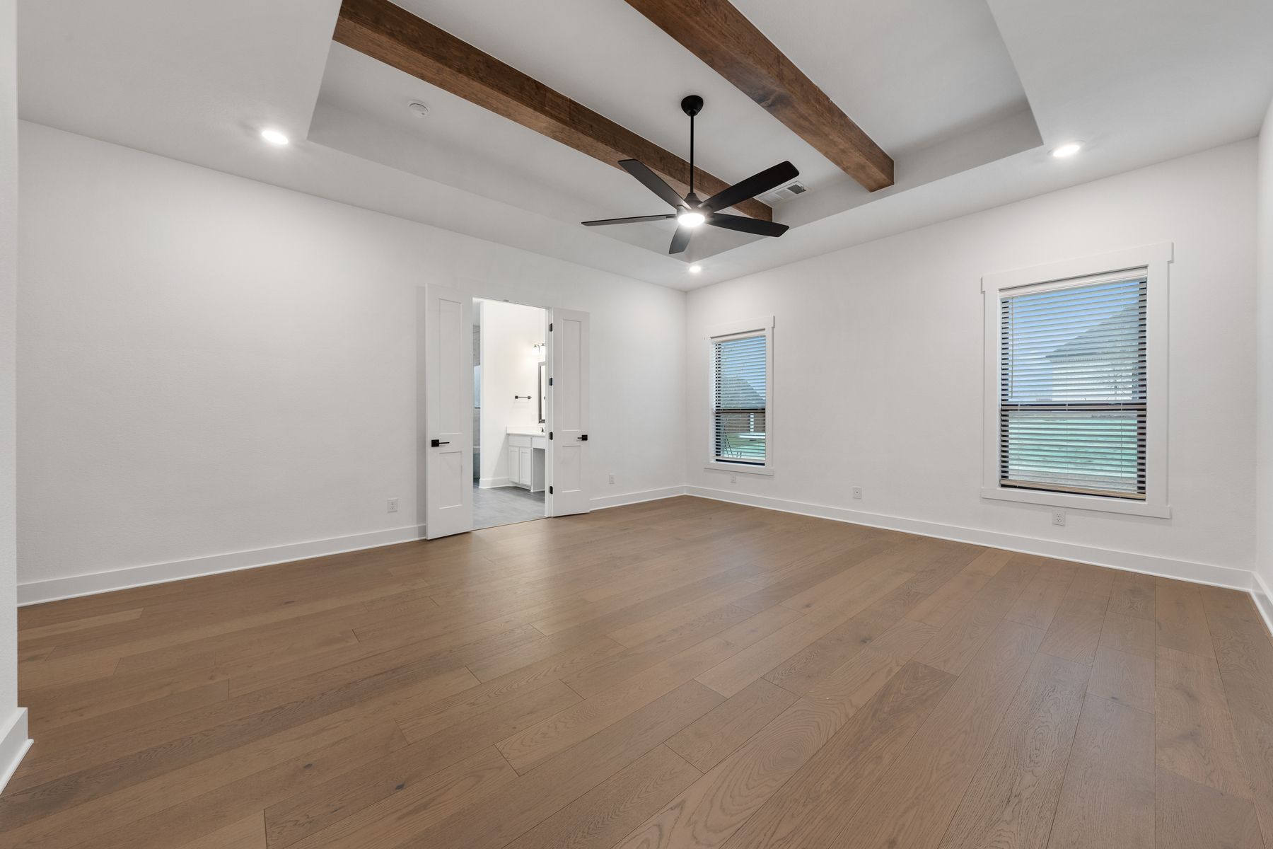 The peaceful master suite has a large bedroom, spa-like bathroom and giant walk-in closet.