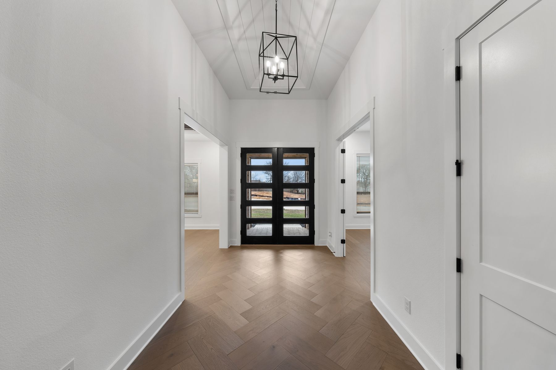 The beautiful foyer welcomes guests into this gorgeous home.