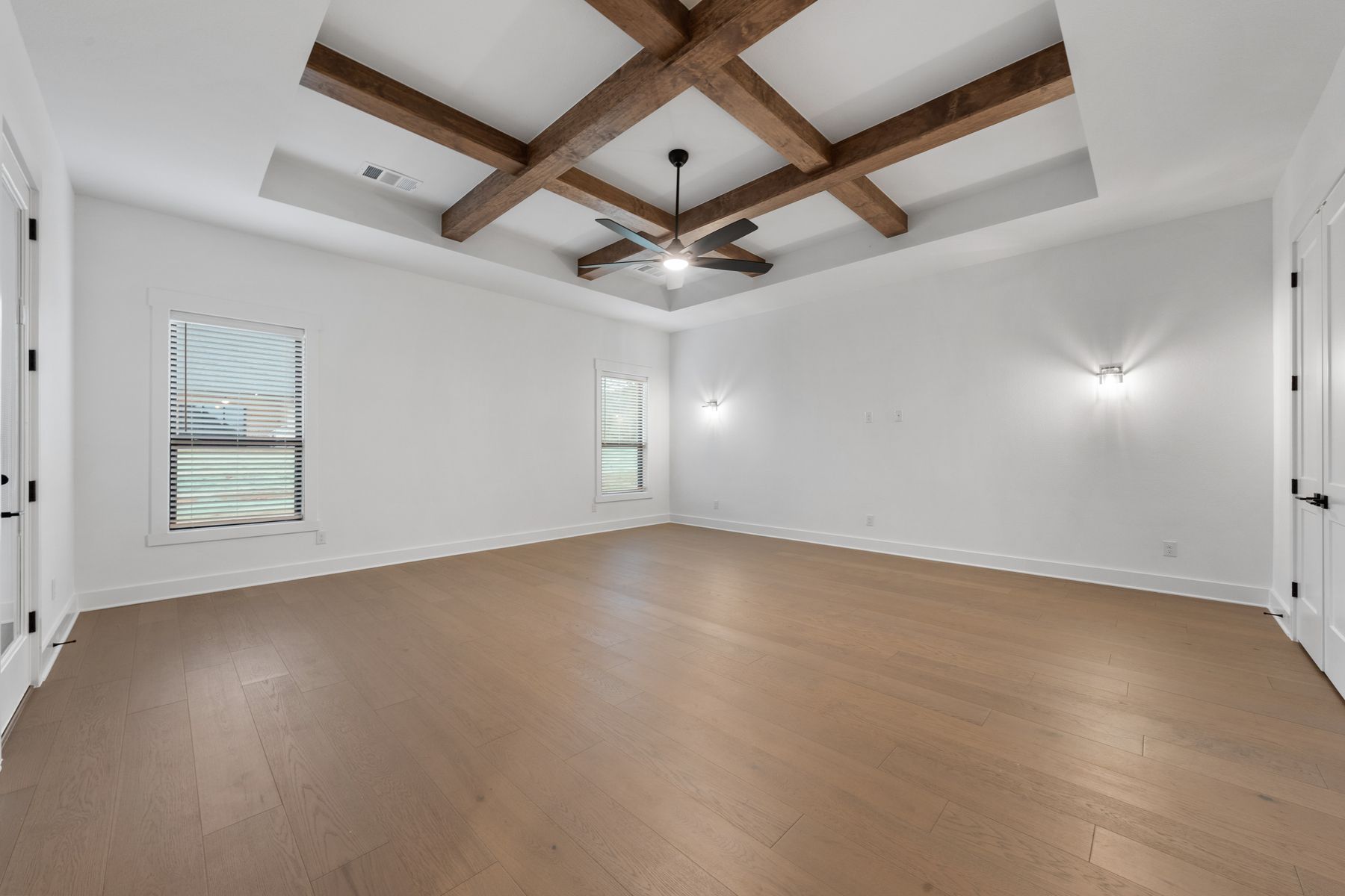 The media room is located right off of the family room and has a large closet.