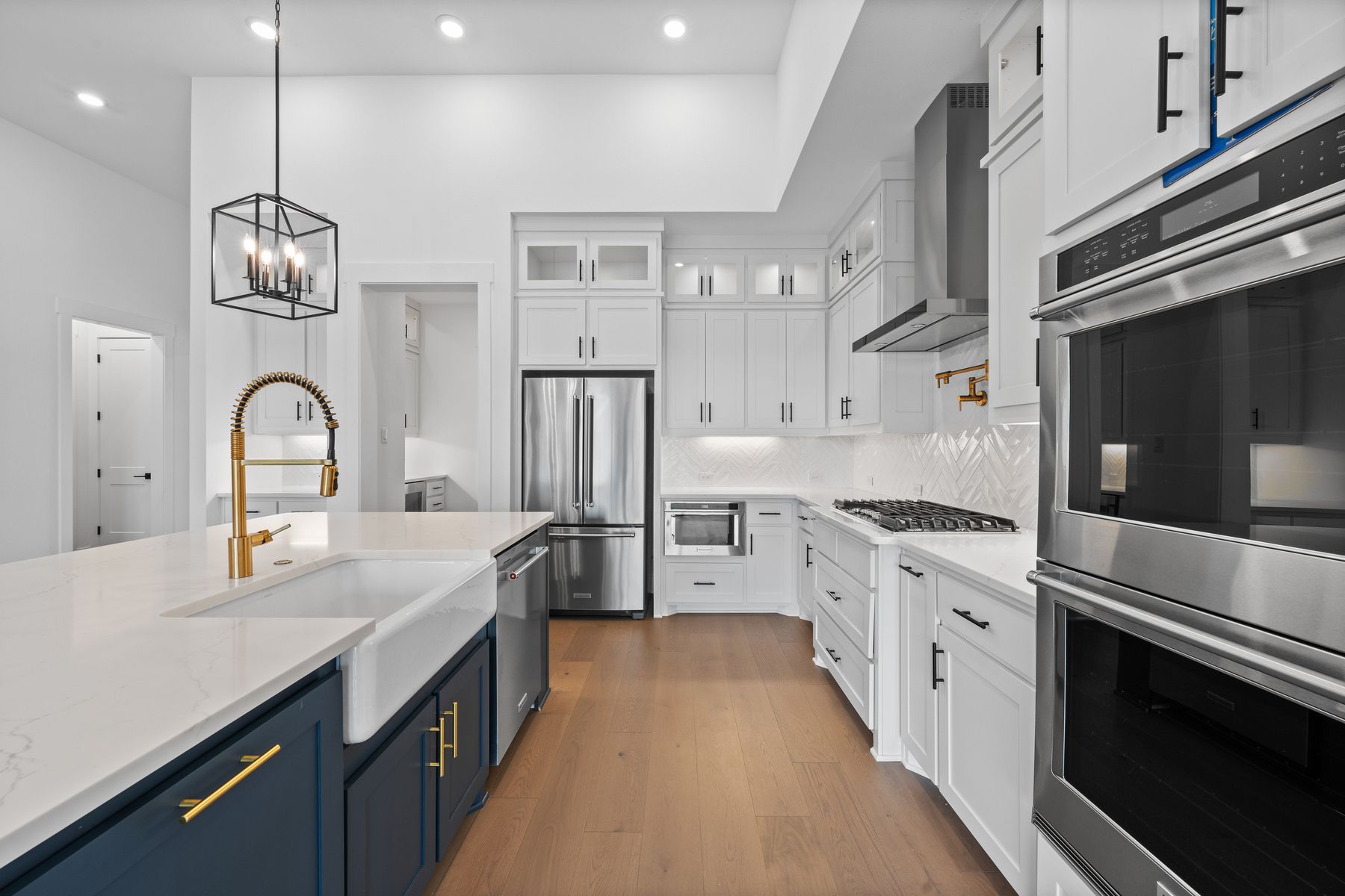 The kitchen has stainless-steel KitchenAid appliances.
