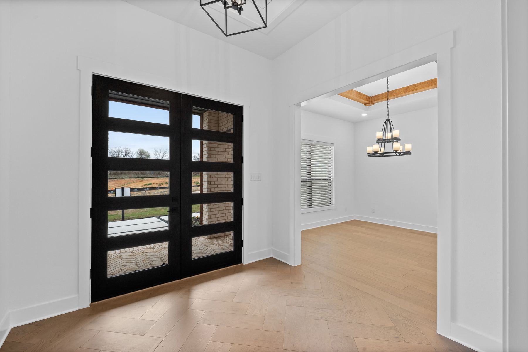 The beautiful foyer welcomes guests into this gorgeous home.