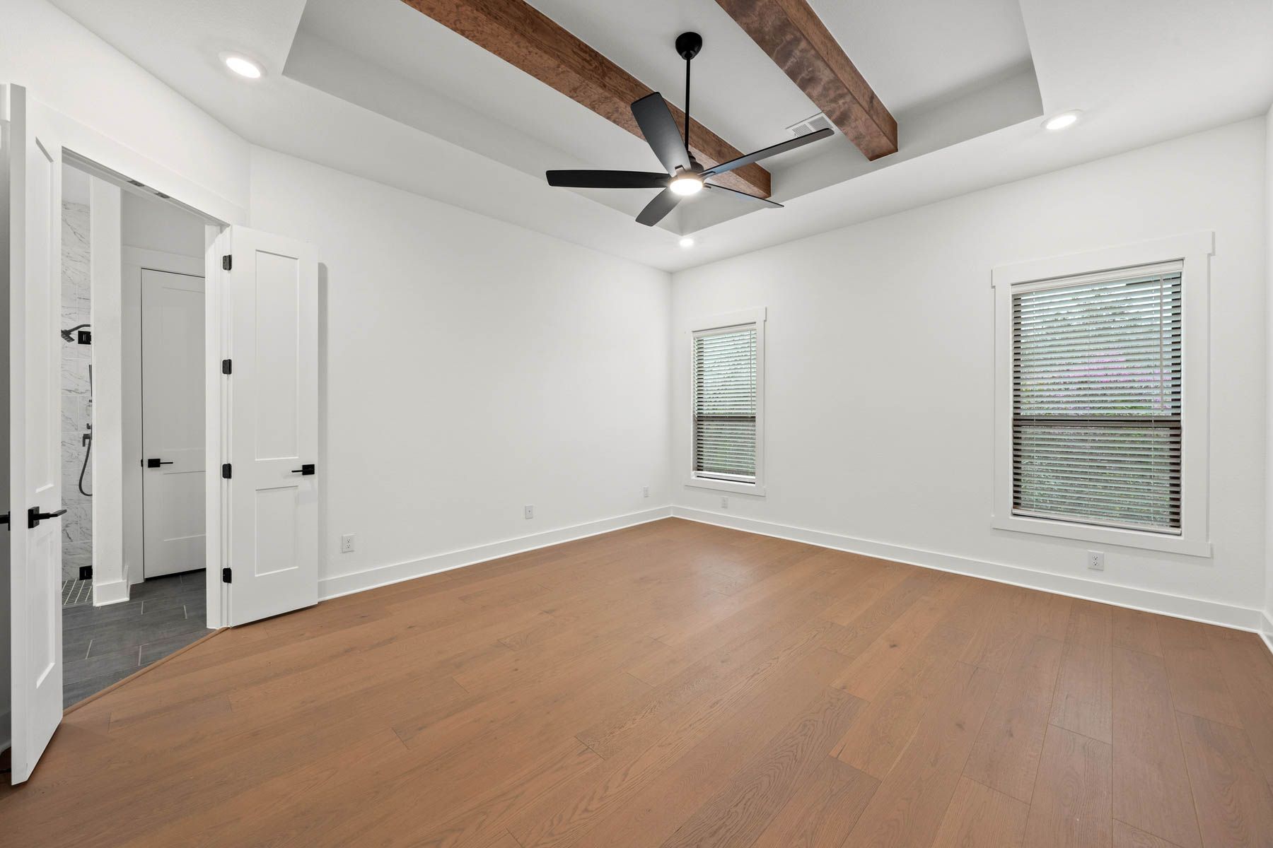 The peaceful master suite has a large bedroom, spa-like bathroom and giant walk-in closet.