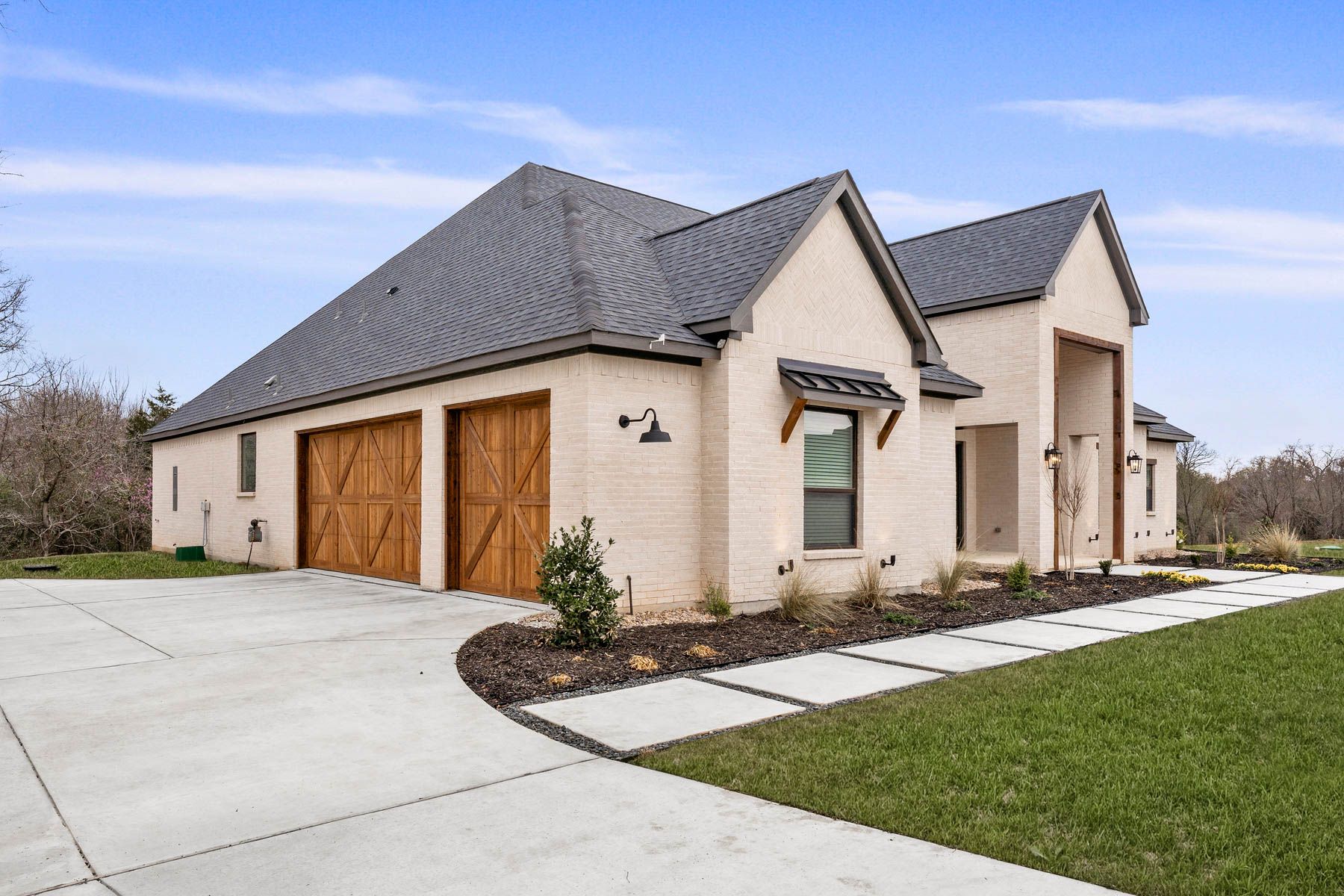 The Timberline II has a side-load three-car garage.