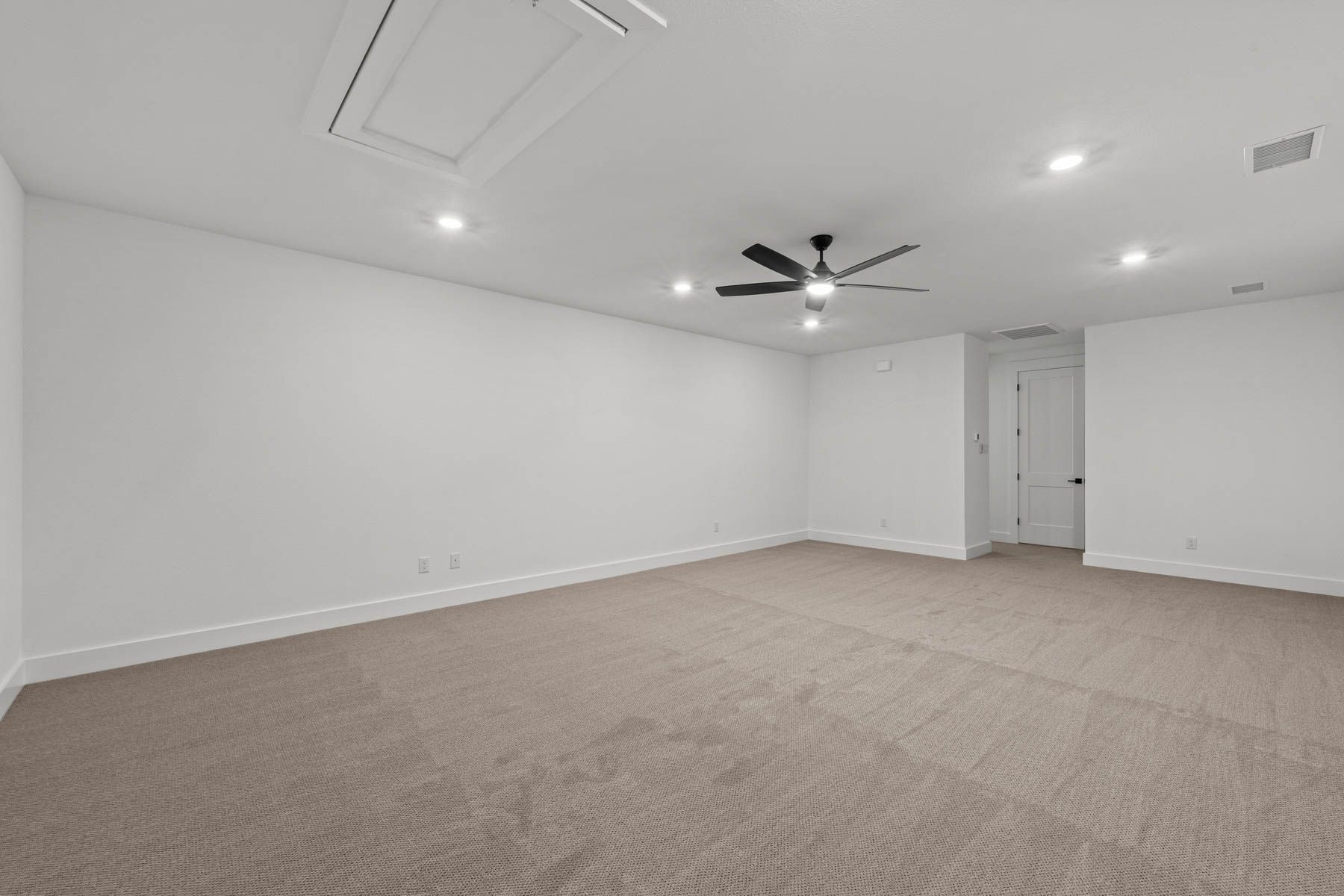 Upstairs, there is a large media room, powder room and storage closet.