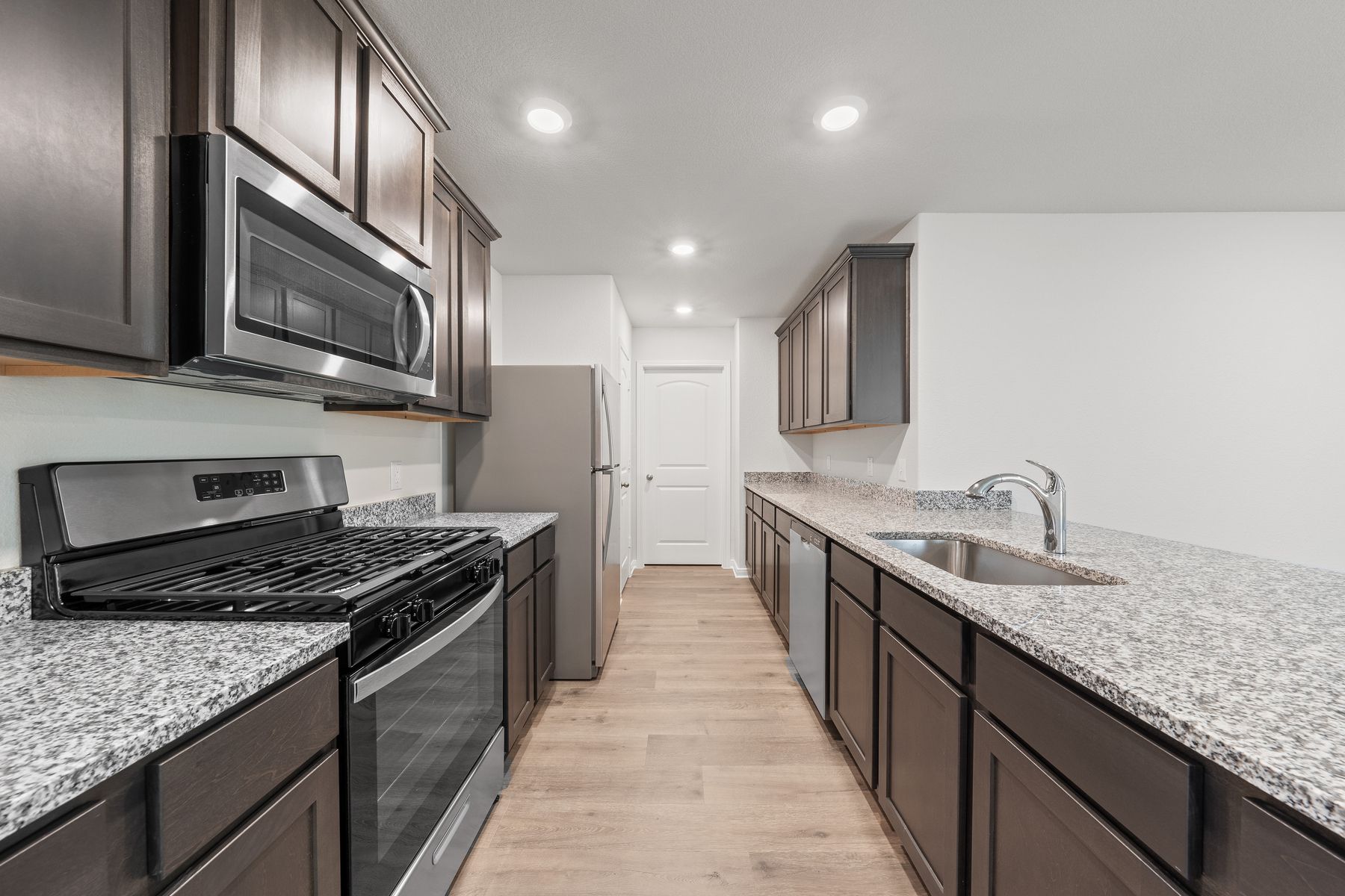 The kitchen of the Cedar has energy-efficient appliances.