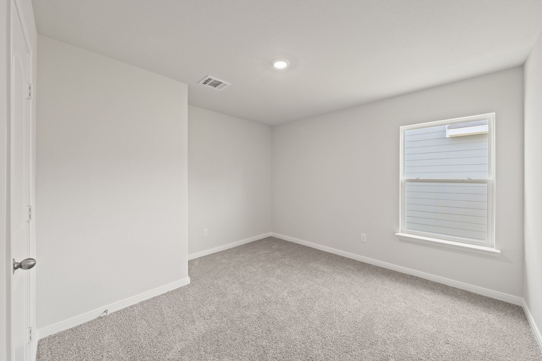 The secondary bedrooms of the Cedar are a perfect space for a child's bedroom or as a guest room.