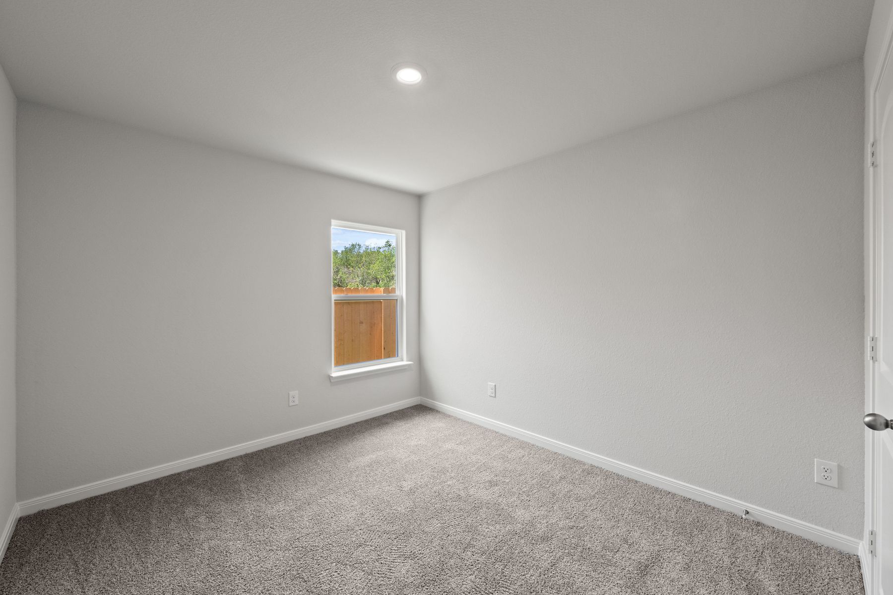 The secondary bedrooms of the Cedar are a perfect space for a child's bedroom or as a guest room.