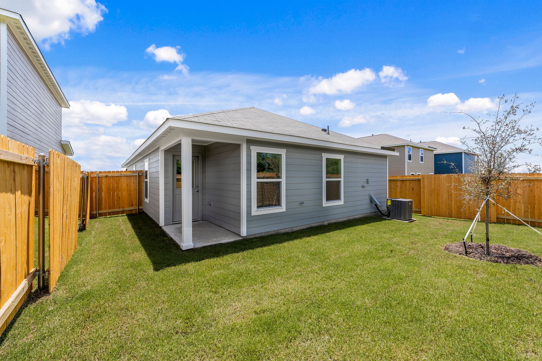 The back yard of the Cedar is fully fenced-in.