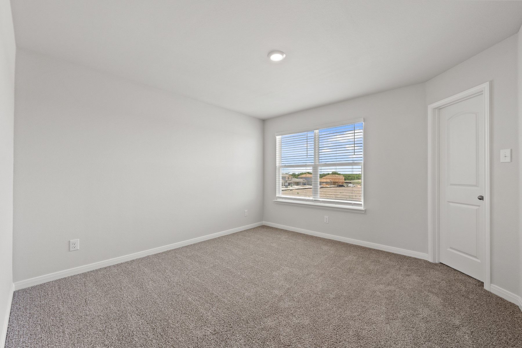 The secondary bedrooms of the Piper plan are the perfect space for a child's bedroom or a guest room.