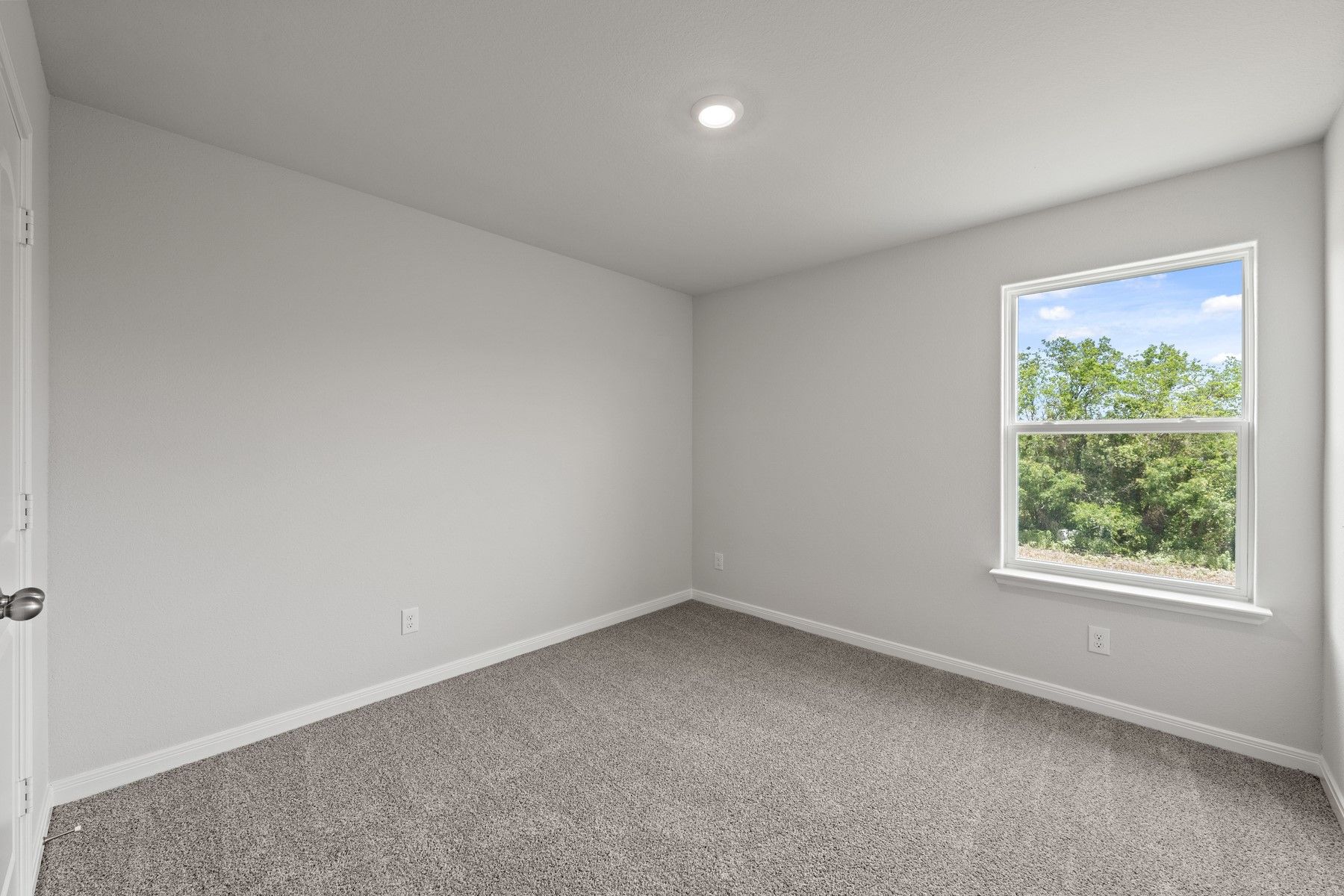 The secondary bedrooms of the Piper plan are the perfect space for a child's bedroom or a guest room.