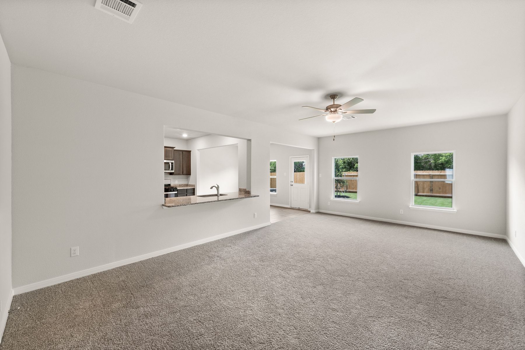 The family room of the Rayburn has two large windows that let in great, natural light.