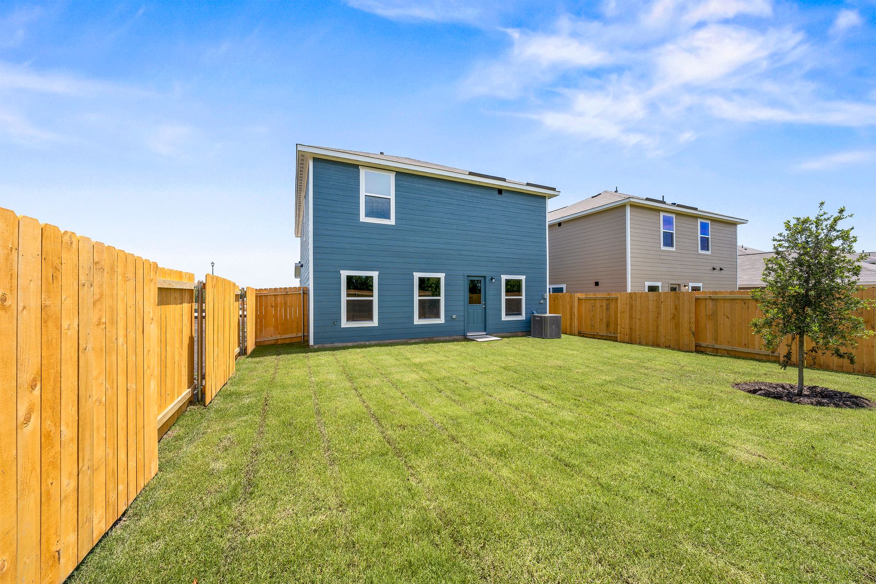 The back yard of the Rayburn is fully fenced-in.