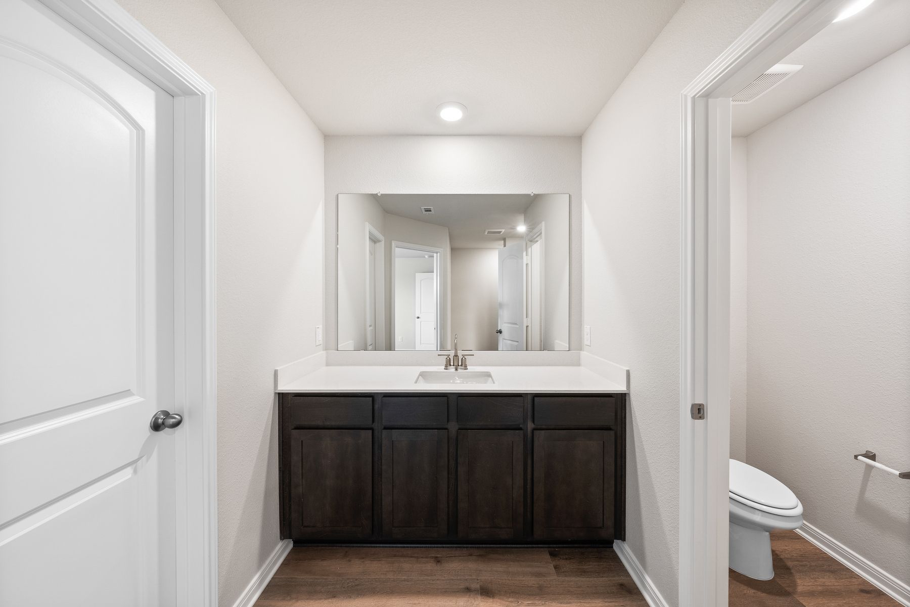 The master bathroom of the Rayburn has a vanity with plenty of counterspace.