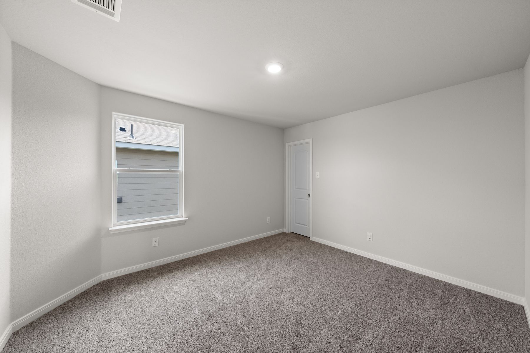 The secondary bedrooms of the Rayburn are a perfect space for a child's bedroom or a guest room.