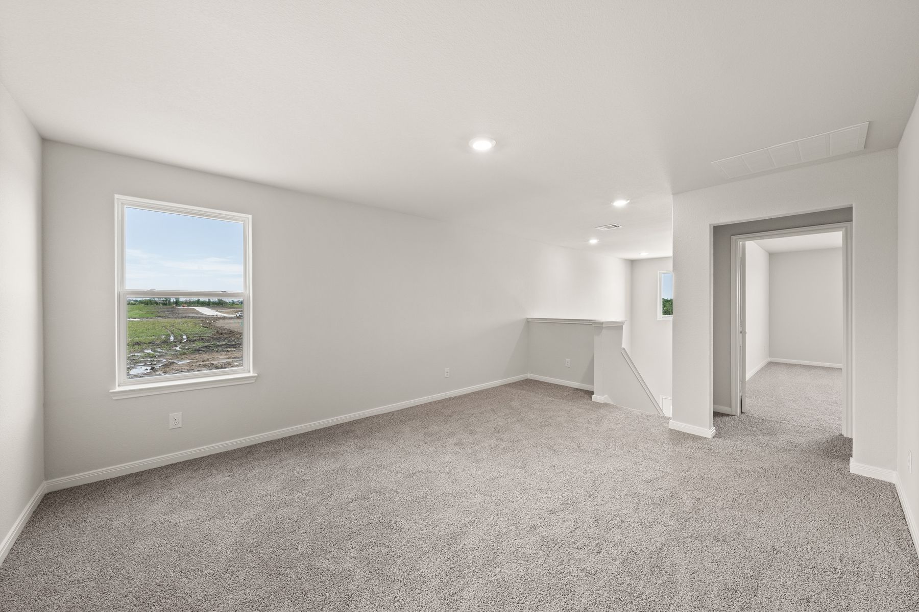The loft of the Rayburn is a great space for a gameroom or playroom.