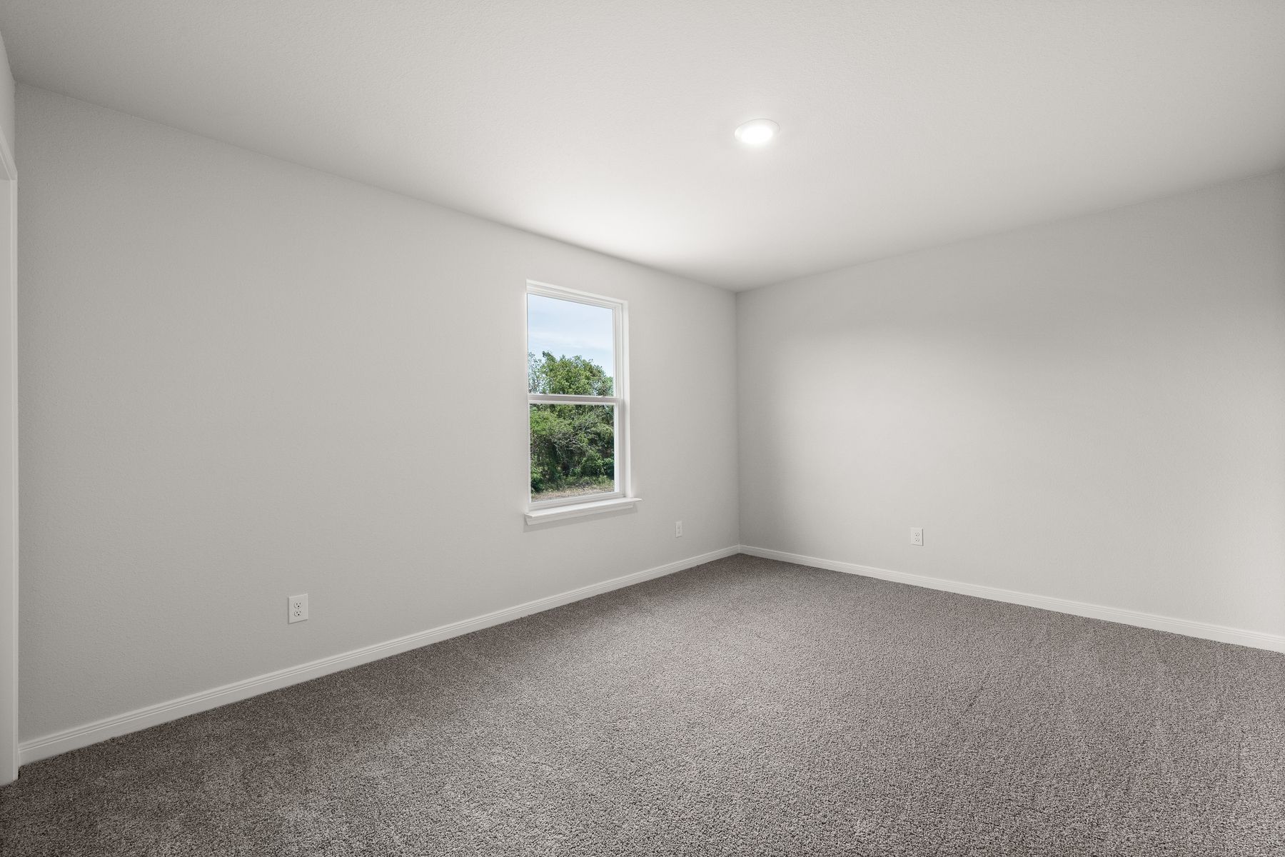 The secondary bedrooms of the Rayburn are a perfect space for a child's bedroom or a guest room.