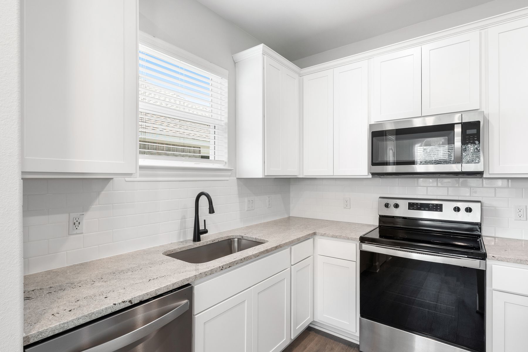 The kitchen of the Blanco has sprawling granite countertops.