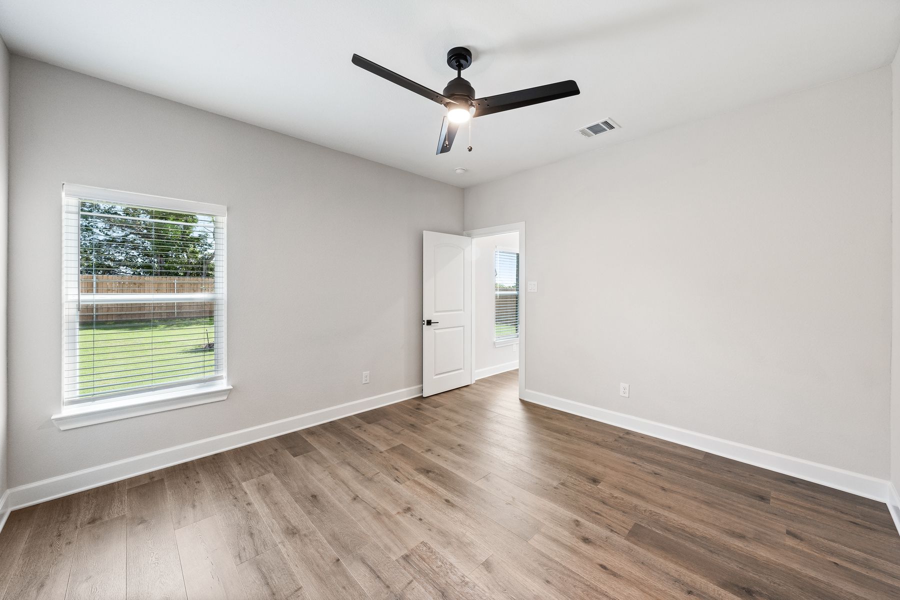 The master bedroom of the Rio Grande is spacious and has a large window that lets in great, natural light.