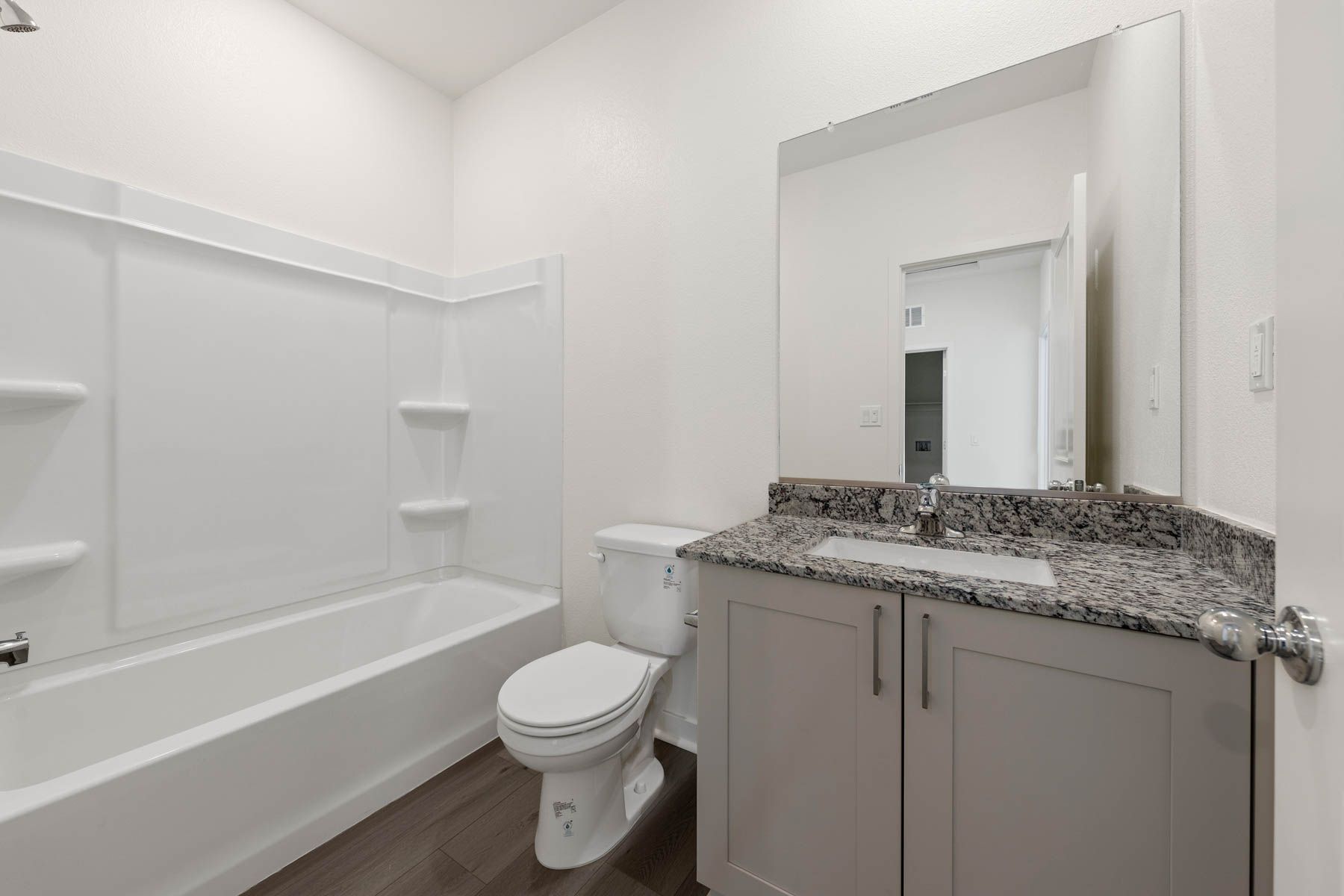 The secondary bathroom has the tub/shower combo.