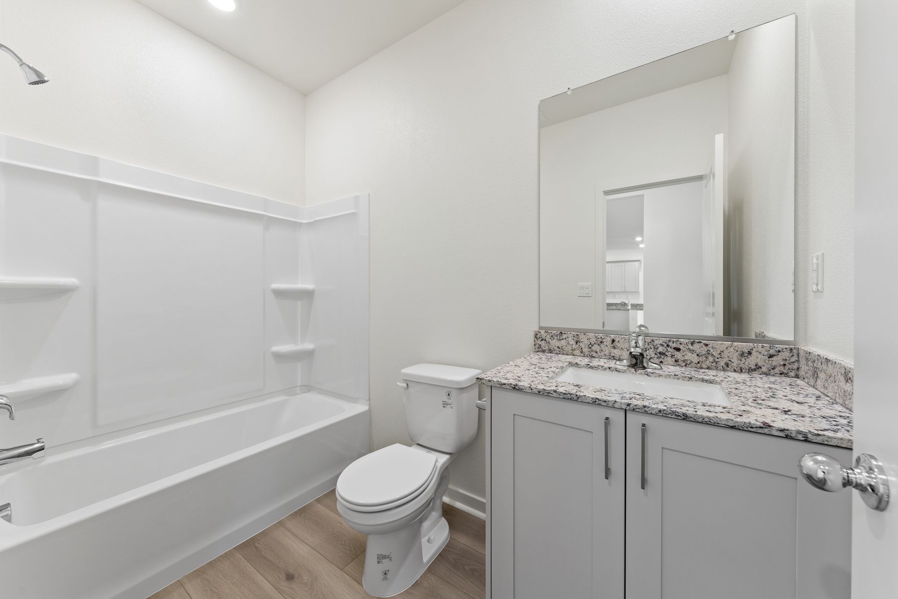 The secondary bathroom has the tub/shower combo.