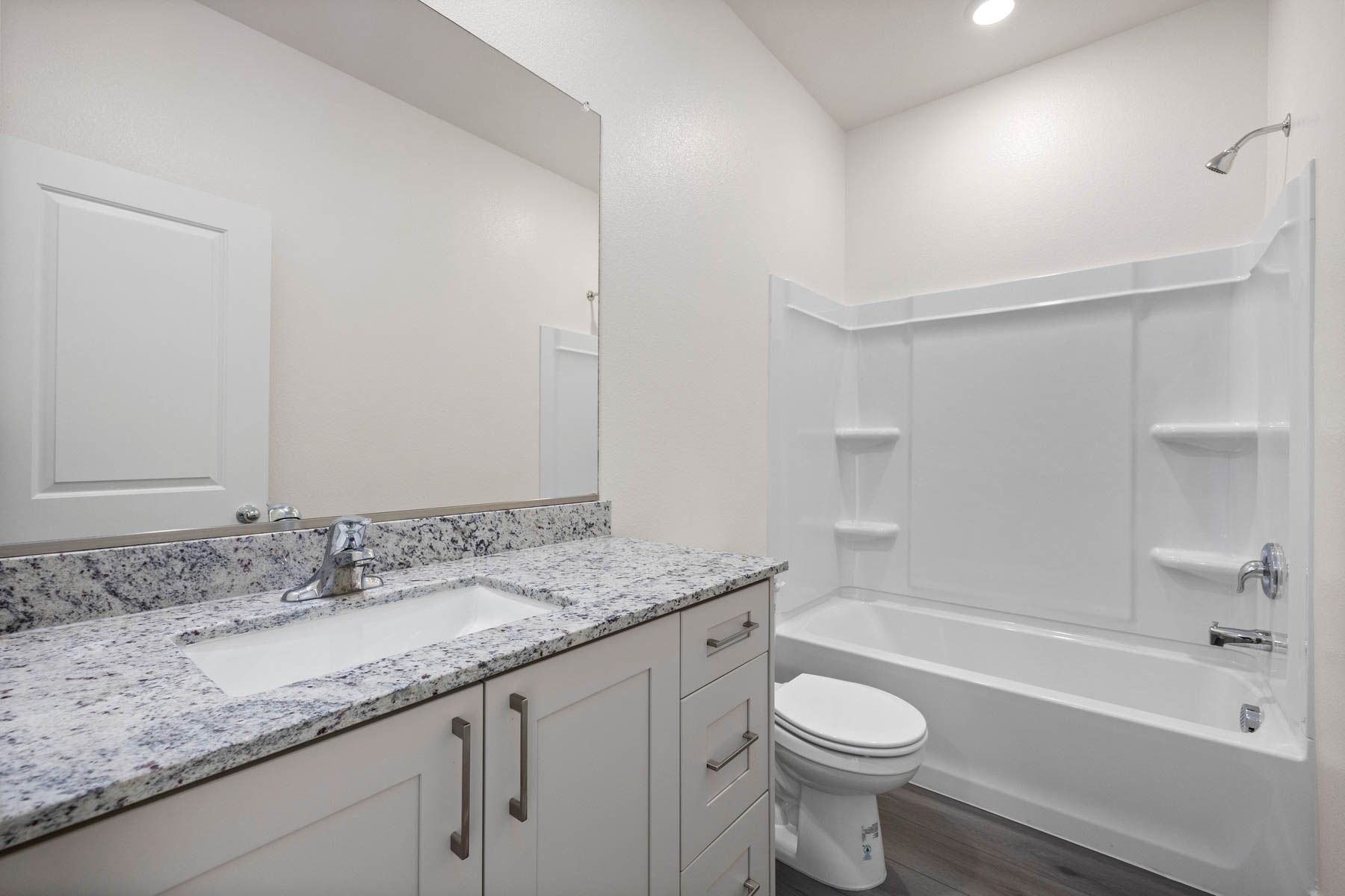 The secondary bathroom has the tub/shower combo.