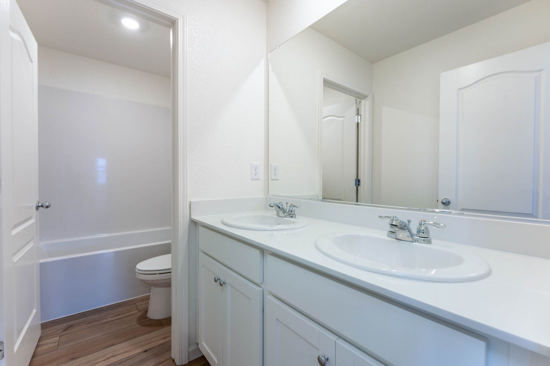 The secondary bathroom has the tub/shower combo.