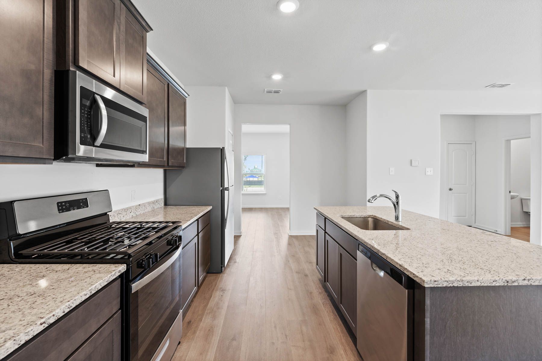 The kitchen of the Camelia has a a full suite of energy-efficient appliances.