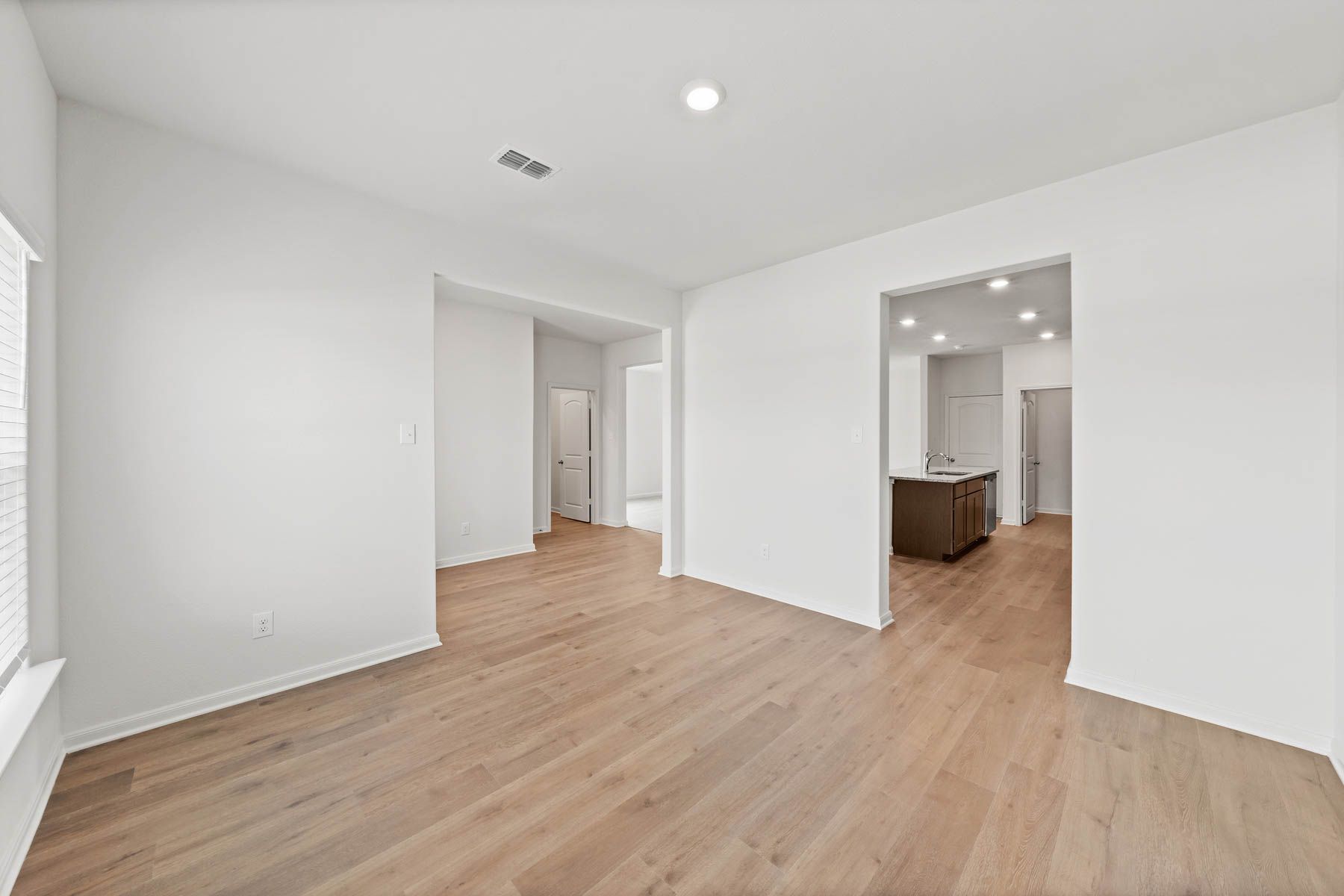 The dining room of the Camelia sits right off of the kitchen.