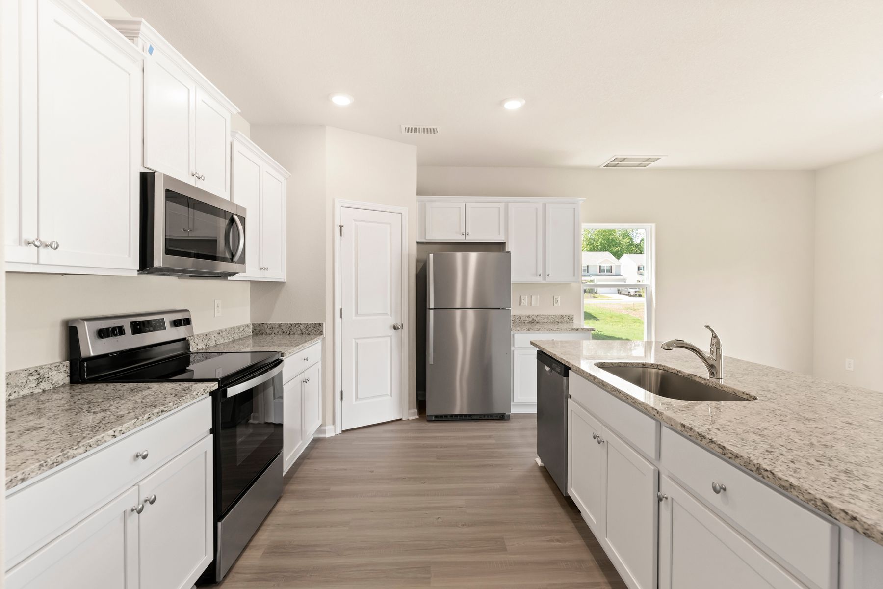 The kitchen comes with granite countertops