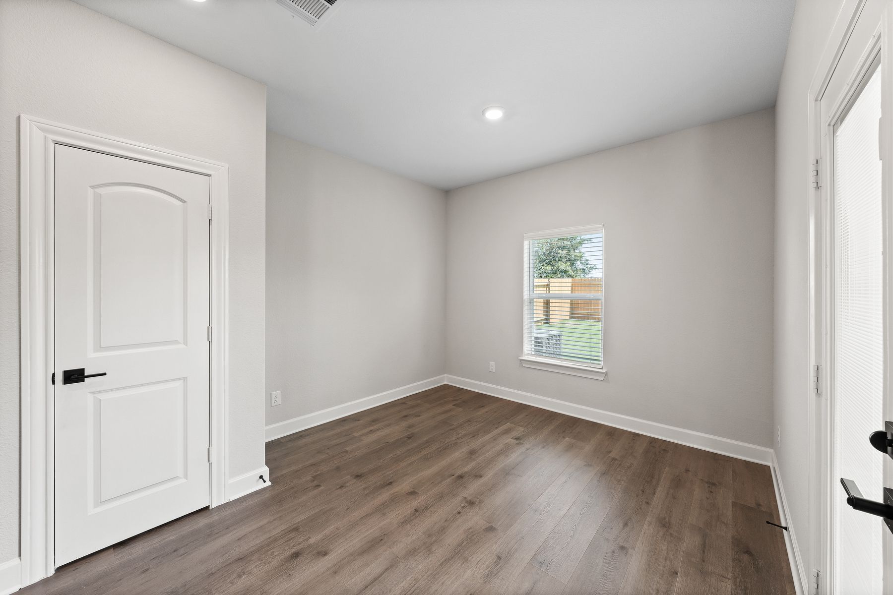 The dining room of the Sabine floor plan has a window that lets in great, natural light.