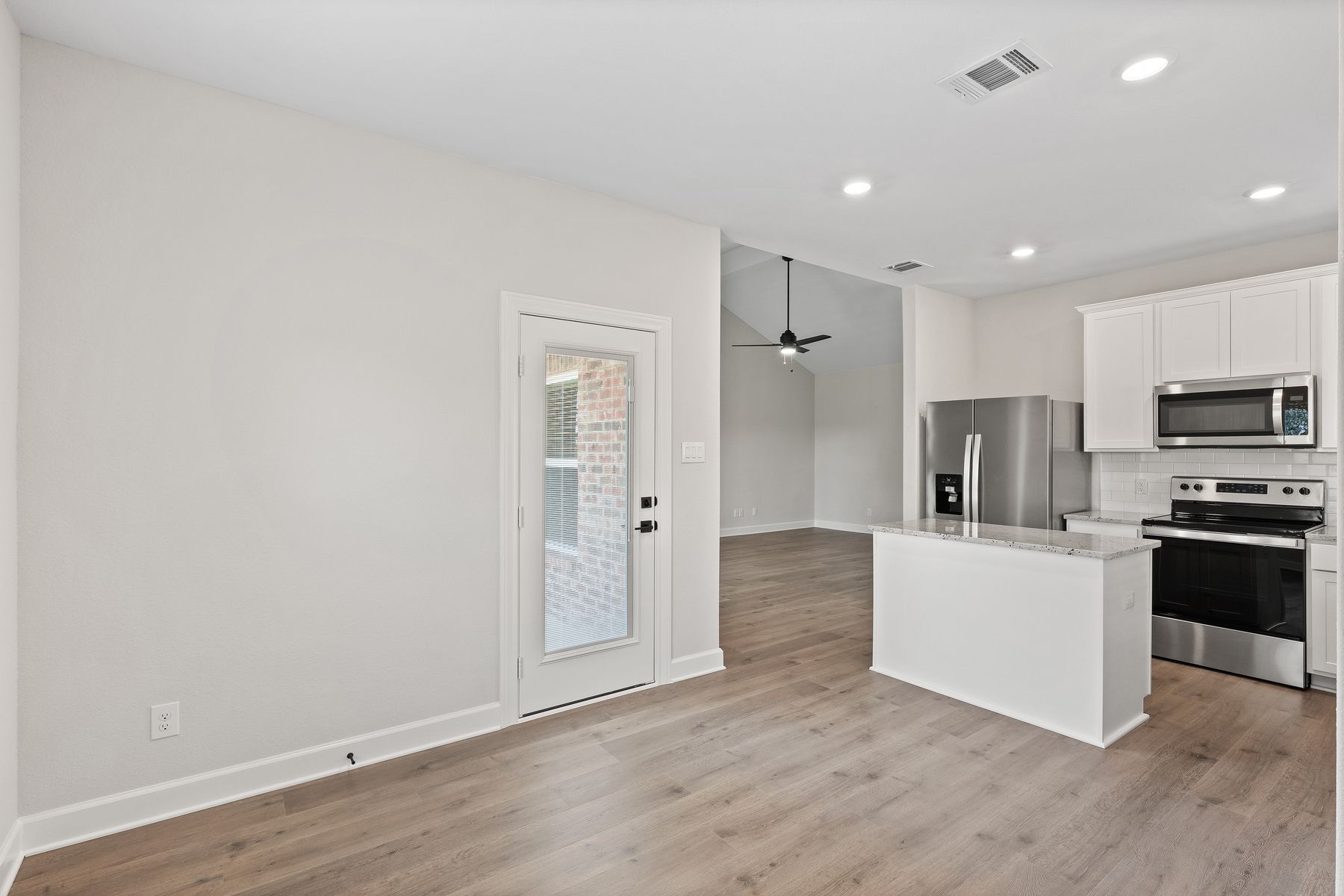 The dining room of the Sabine floor plan sits right off of the kitchen.