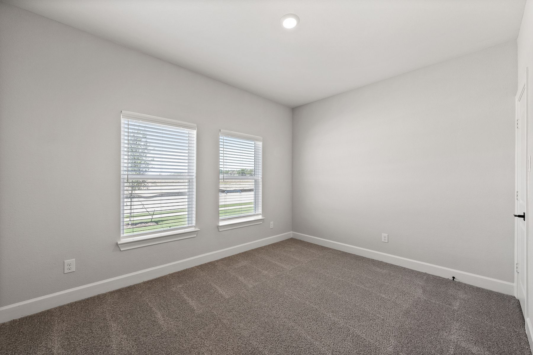 The secondary bedrooms of the Sabine floor plan are a great space for children's bedrooms or as guest rooms.