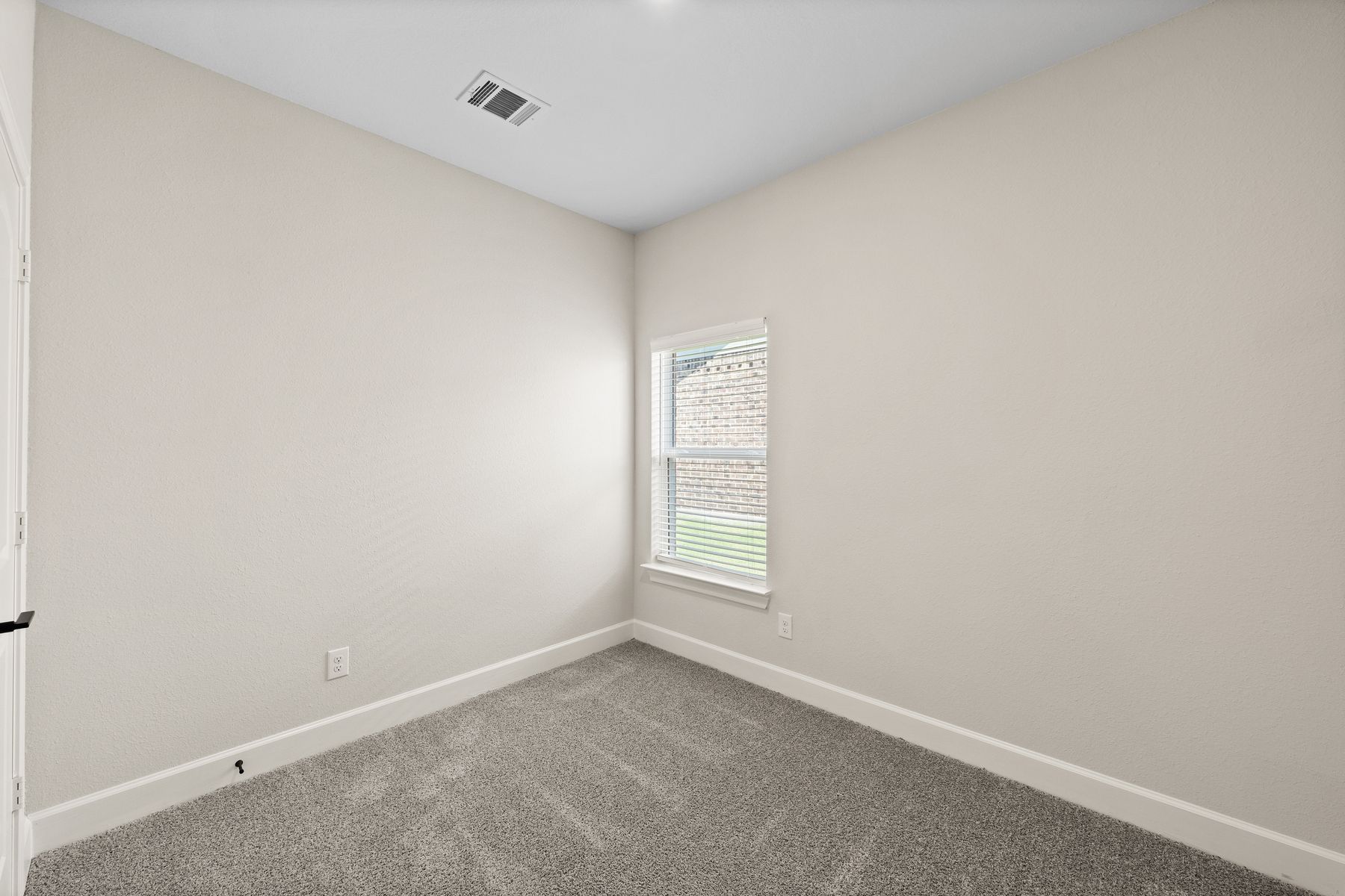 The flex room in the Sabine floor plan is a great space for an at-home office or a playroom.