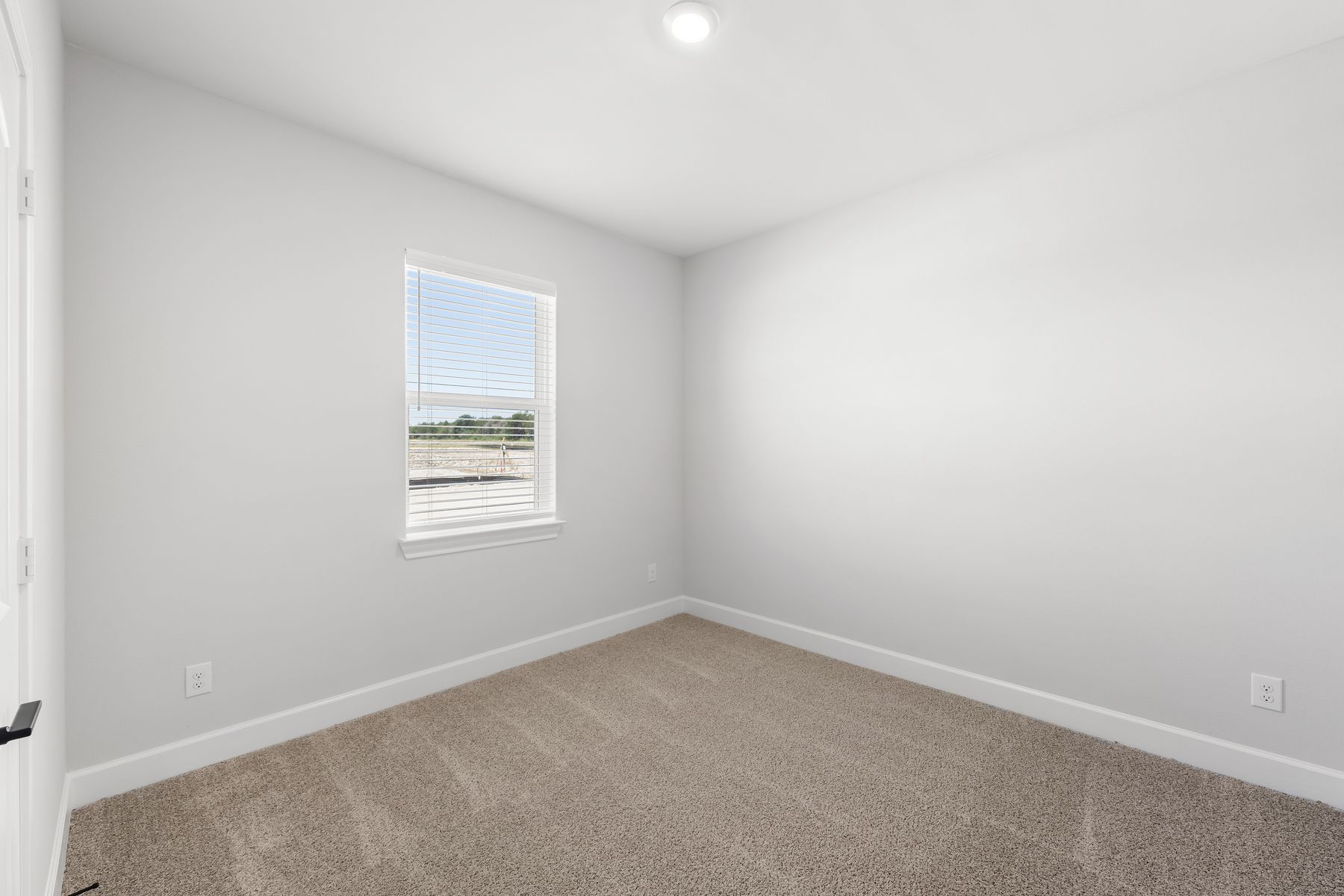 The secondary bedrooms of the Reed plan are a great space for childrens bedrooms or guest rooms.