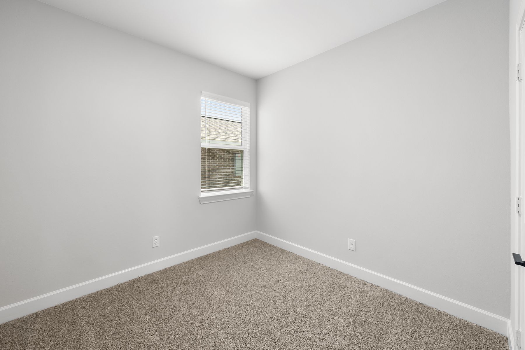 The secondary bedrooms of the Reed plan are a great space for childrens bedrooms or guest rooms.