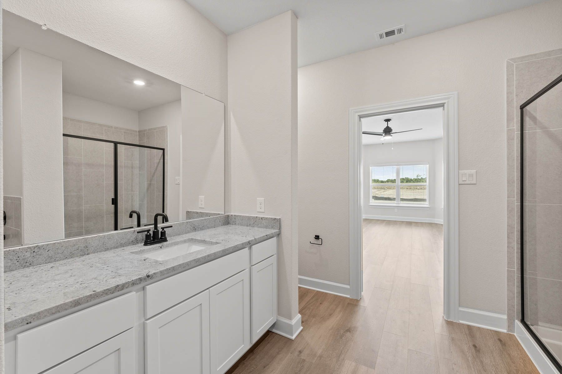 The master bathroom of the Cypress has a large vanity space.