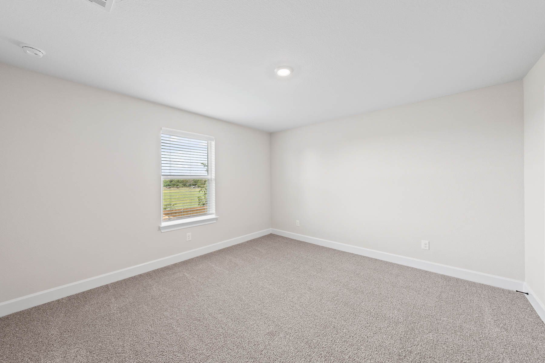 The secondary bedrooms of the Cypress floor plan are a great space for childrens bedrooms or as guest rooms.